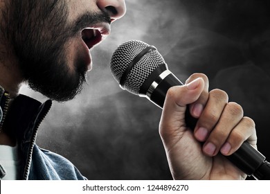 Close Up Singer Singing With Microphone