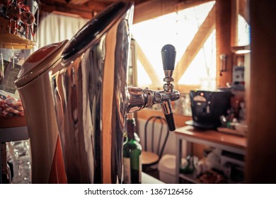 Close Up Of Single Tap Chrome Draft Beer Kegerator Tower At Bar Or Pub.