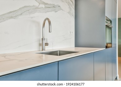 Close Up Of Sink In Luxury Kitchen