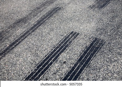 A Close Up Of Skid Marks On A Road.