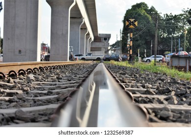 close up sky train line reflection on railway track