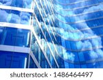 close up of skyscraper window. Blue colored