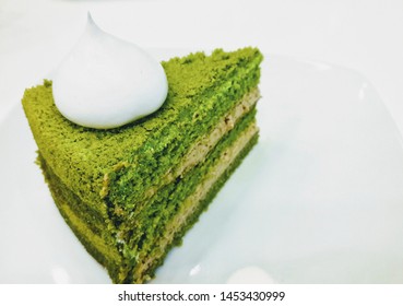 Close Up Of A Sliced Matcha Green Tea Chiffon Cake