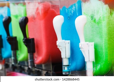 Close Up Of Slush Machine. Slushy Ice Made Colorful Drink Refreshing During Summer