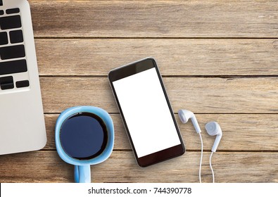 Close up smart phone,laptop computer and cup of coffee on brown old wood background and texture with copy space for any design - Shutterstock ID 744390778