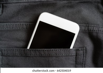 Close up of smartphone in back pocket on black pants