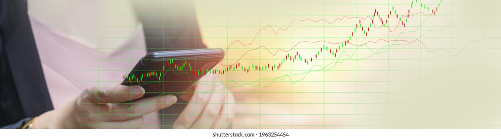 Close Up Smartphone In Hand Business Woman With Stock Chart, Candlestick Chart, Analysis Market Graph. Banner Size With Copy Space.