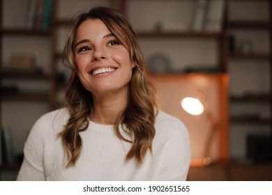 Close Up Of A Smiling Attractive Young Woman In The Office