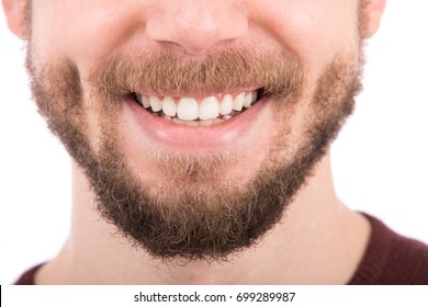 Close Up Of Smiling Face, Young Man Giving A Smile, Isolated On White Background