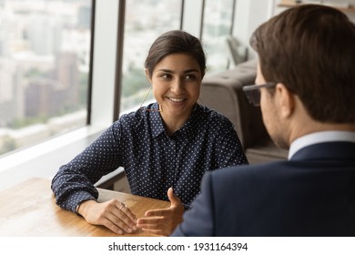 Close Up Smiling Indian Businesswoman And Caucasian Businessman Talking At Meeting, Colleagues Discussing Project, Sharing Ideas, Hr Manager Recruiter Interviewing Candidate, Job Interview