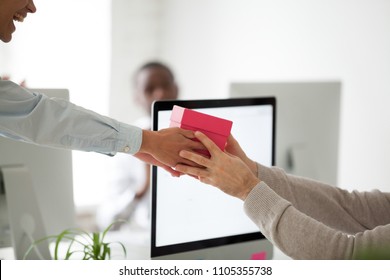 Close Up Of Smiling Office Worker Congratulating Colleague With Birthday, Giving Present In Gift Box, Greeting Coworker With Special Occasion Making Surprise. Concept Of Celebration, Good Relationship
