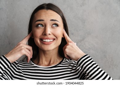 442 Woman blocking her ears Images, Stock Photos & Vectors | Shutterstock