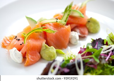 Close up of smoked salmon salad with green asparagus - Powered by Shutterstock