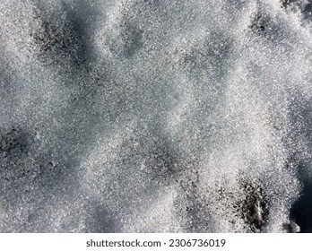 A close up of snow, on the ground