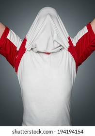 Close Up Of Soccer Fan, Player With His Jersey Pulled On The Head Showing Blank T Shirt With Copy Space