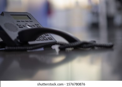 Close Up Soft Focus On Ip Phone Devices Put On Wood Floor,Cocept Business Work.