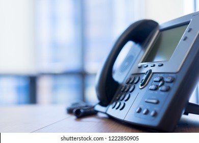 Close Up Soft Focus On VOIP Telephone For Network Operation Career Stand On Office Desk, Advance Technology Telecommunication Concept