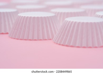 Close Up Soft Light Empty White Paper Round Cupcake Containers On Sweet Pink Minimal Background With Copy Space.idea For Dessert Backdrop,bakery Supplies Shop Wallpaper.