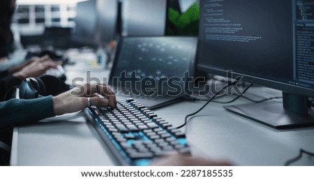Close Up of a Software Developer Working on a Desktop Computer, Implementing New Features and Updates to a Company Server. Stylish Specialist Wearing Rings and Bracelet, Typing on Keyboard