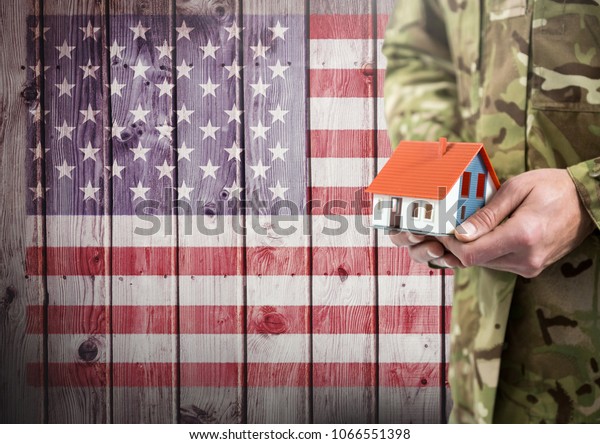 Close Soldier Holding Little House Front Stock Photo (Edit Now) 1066551398