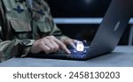 close up soldier man hand use laptop check authorization to access security data with security and privacy virtual icon for military operation control system concept