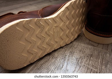 Close up of the sole of a pair of leather boots - Shutterstock ID 1350363743