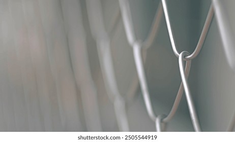 Close up Solid Metallic Wire Mesh Chain link Fence in Vintage Style Steel. Selective focus wire mesh fence - Powered by Shutterstock