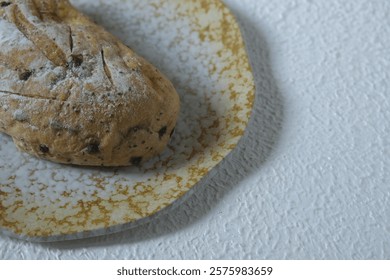 Close up  sourdough bread on rustic plate. Healthy food, breakfast time.  Roti