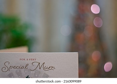 Close Up Of Special Mum Greetings, Birthday Or Christmas Card With Bokeh Lights In Background. Boston UK. Dec 2021