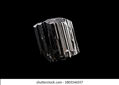 Close Up Of A Specimen Of Black Shiny Rough Tourmaline Stone Mineral, On A Black Limbo Background