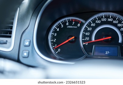 Close up of a speedometer in a car with shallow depth of field