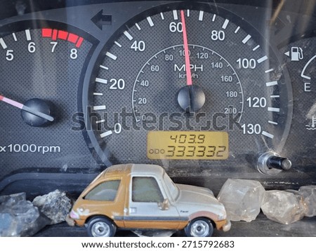 Close Up of Speedometer and Odometer on Dash in Car, High Mileage 300,000 Miles