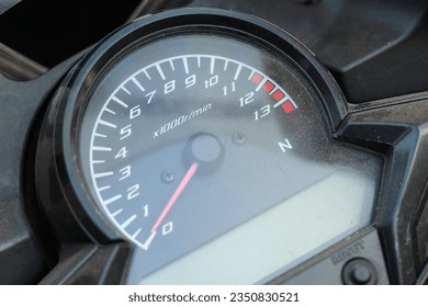 close up of the speedometer on a motorcycle