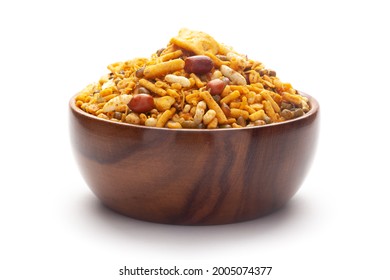 Close up of spicy Ratlami mixture Indian namkeen (snacks) In hand-made (handcrafted) wooden bowl.