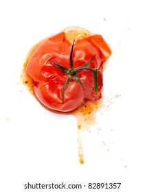 Close Up Of  A Splattered Tomato On White Background