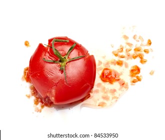 Close Up Of  A Splattered Tomato On White Background