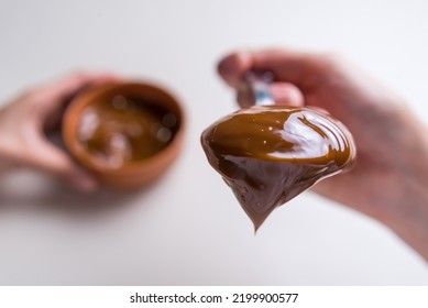 Close Up Of Spoon With Dulce De Leche