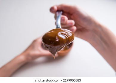 Close Up Of Spoon With Dulce De Leche