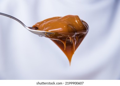 Close Up Of Spoon With Dulce De Leche