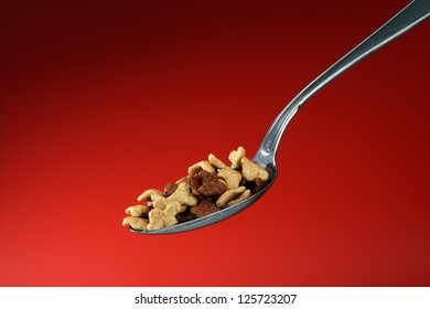Close up of spoon filled with cornflakes - Shutterstock ID 125723207