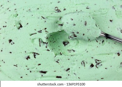 Close Up Of A Spoonful Of Soft Creamy Mint Chocolate Ice Cream