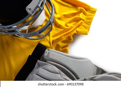 Close up of sports jersey with helmet on white background - Powered by Shutterstock