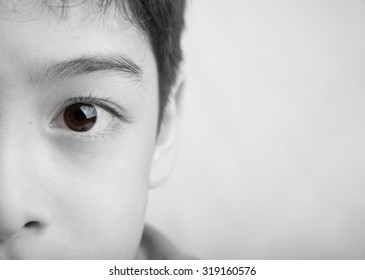 Close Up Spot Color Eyes Of Boy Black And White 