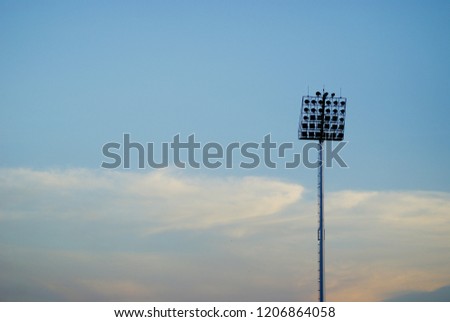 Close up spotlight installed around football stadium and prepare for football game with blue sky background