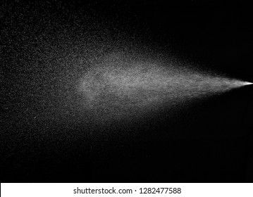 close up of spray water on black background - Shutterstock ID 1282477588