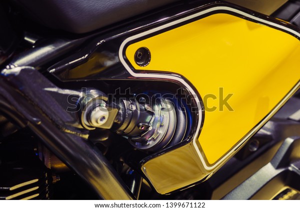 Close\
up the spring and the shock absorbers motorcycle. Hydraulic shock\
absorber oil cylinder.Motorcycle vibration\
system.