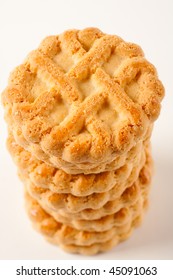 Close up of a stack of biscuits isolated on white