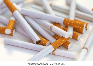 Close up stack of cigarettes on white background. cigarettes isolated on white