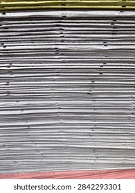 close up stack of paper 