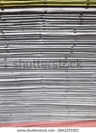 close up stack of paper 